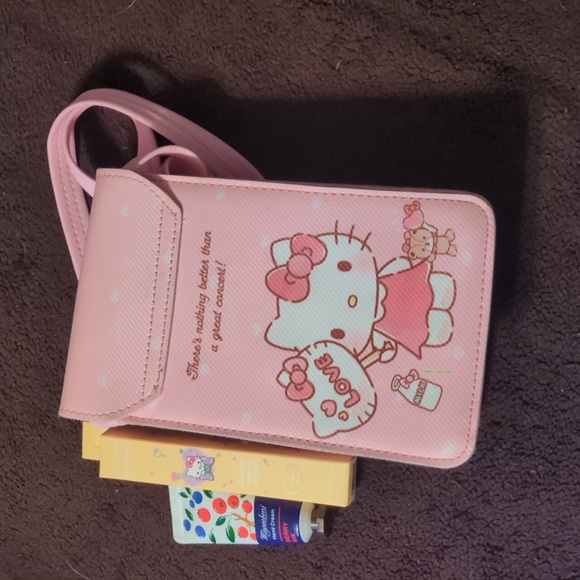 Bundle 1 - Girls Size 14: Dress, Hello Kitty Purse, Lip Balm & Mini Hand Lotion - Picture 6 of 8